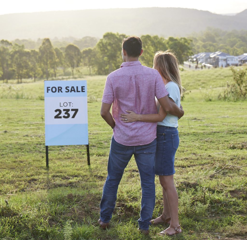 First home owners looking at their new land